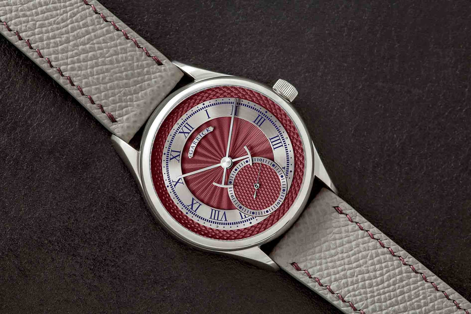 English made S7 watch with red guilloche dial by Garrick Watchmakers