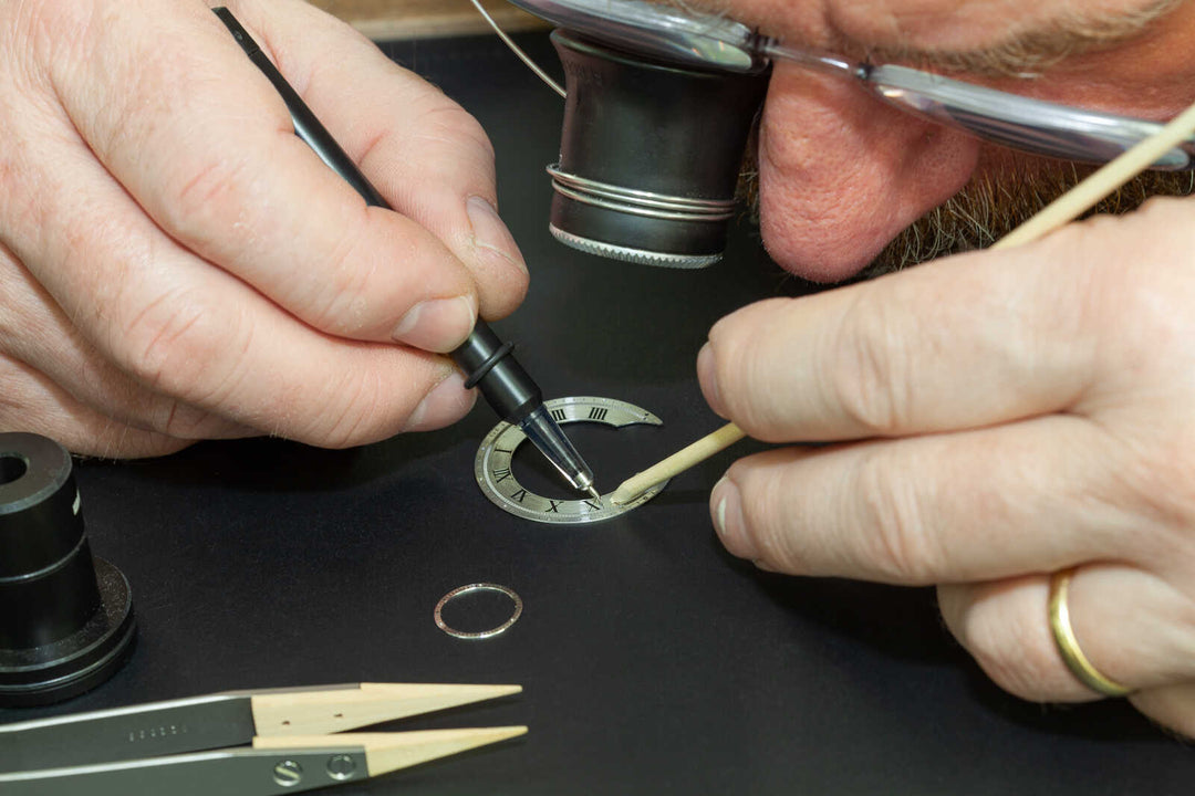 Infilling roman numerals on a British made Garrick watch dial