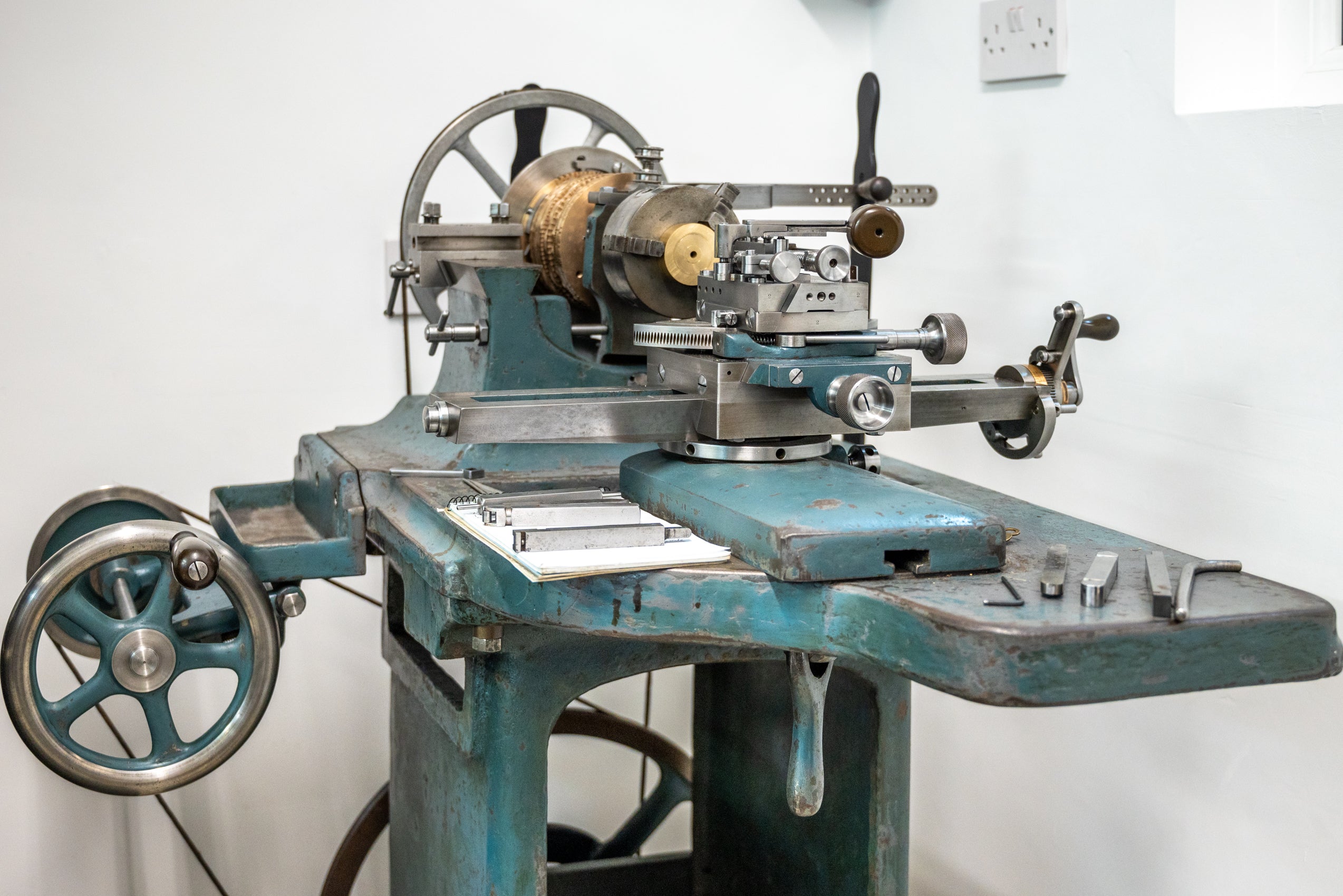 Historic rose engine lathe in Garrick's British watchmaking workshop
