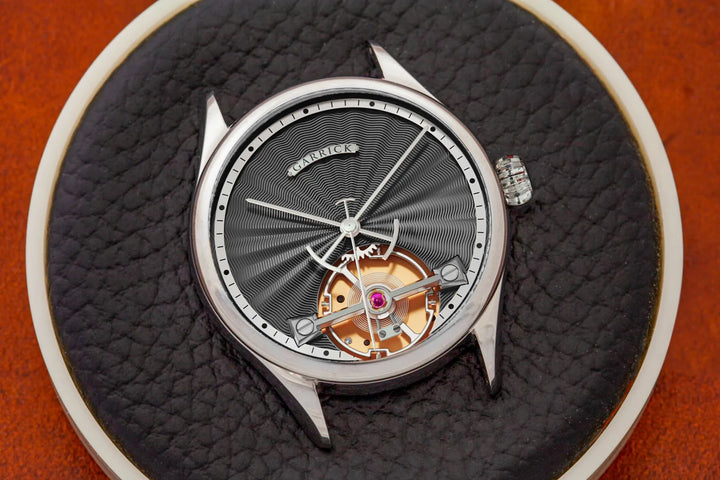 English made deadbeat seconds watch with engine turned dial by Garrick Watchmakers