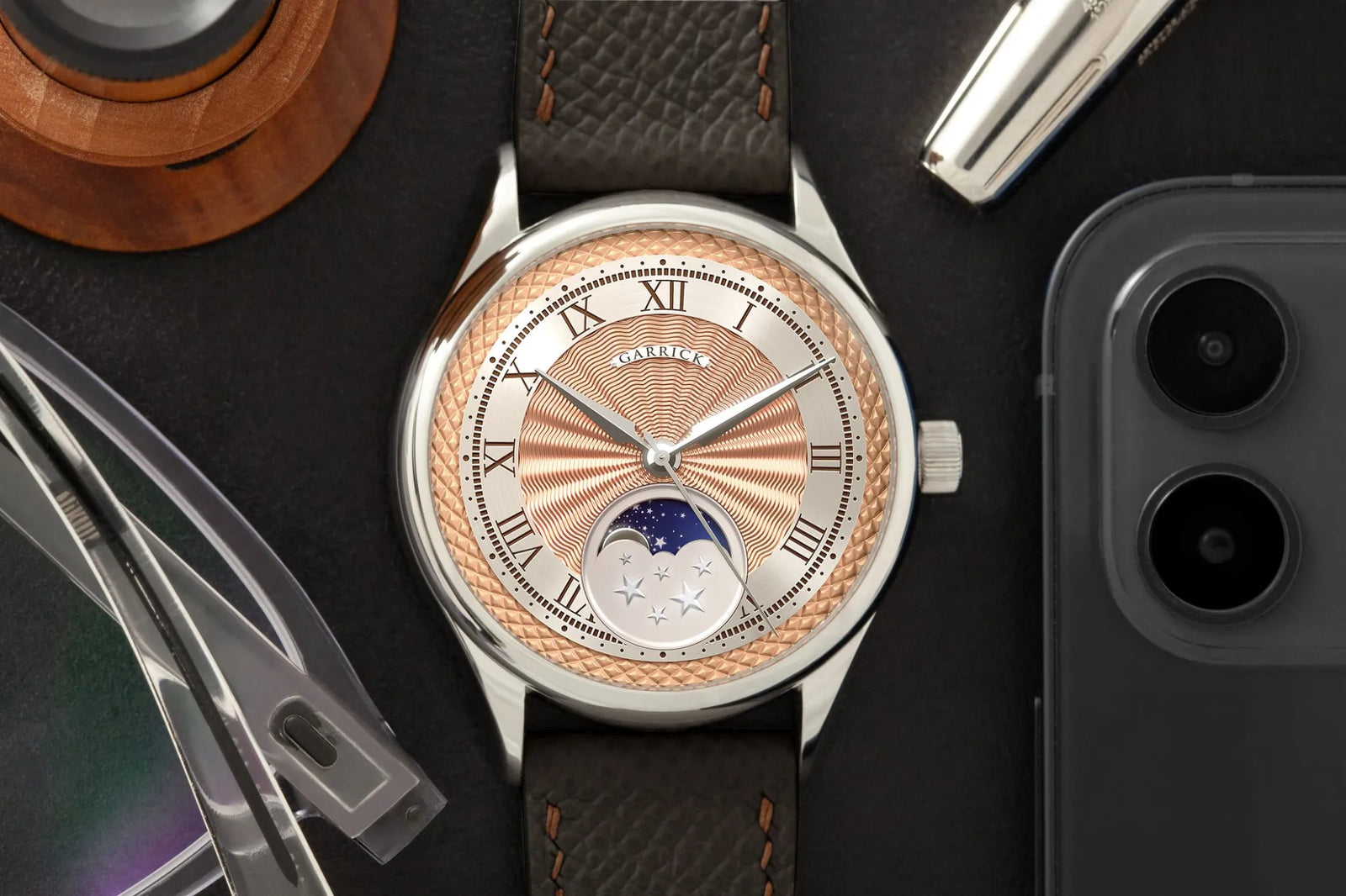 British made S5 watch with moon phase indication and pink gold engine turned dial by Garrick Watchmakers