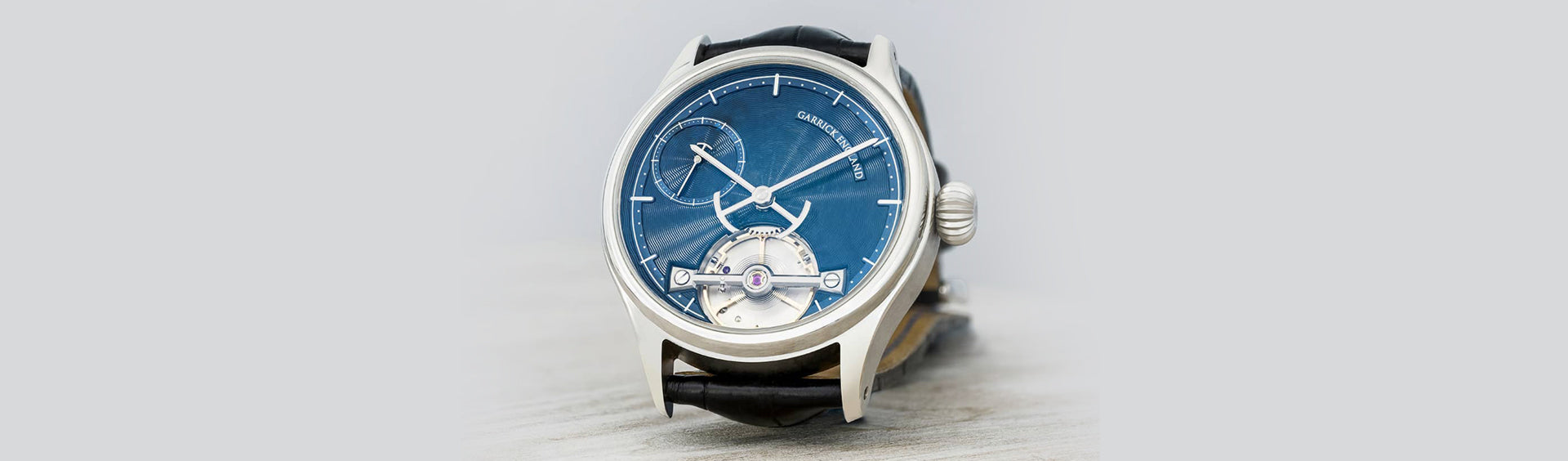 Portsmouth watch with guilloche dial and free-sprung balance by Garrick Watchmakers